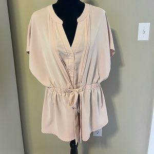 Two blouses one mauve and one emerald green. XL